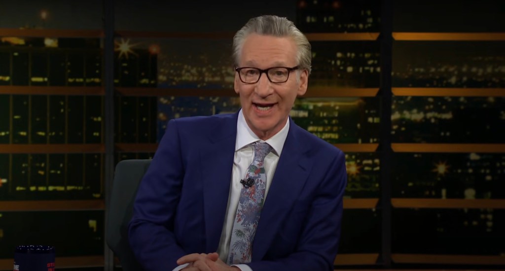 Comedian Bill Maher talking during a broadcast of real conversations